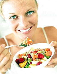 Woman Holding Fruit Bowl