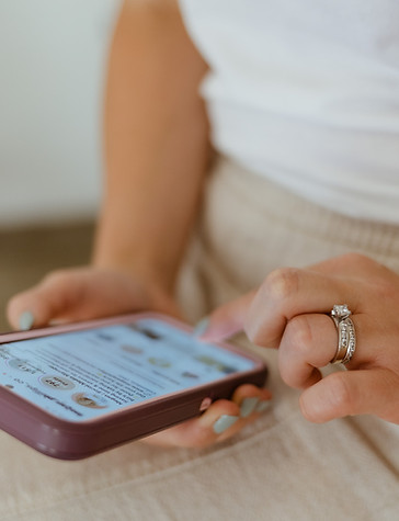 A generic photo of hands typing on a cell phone