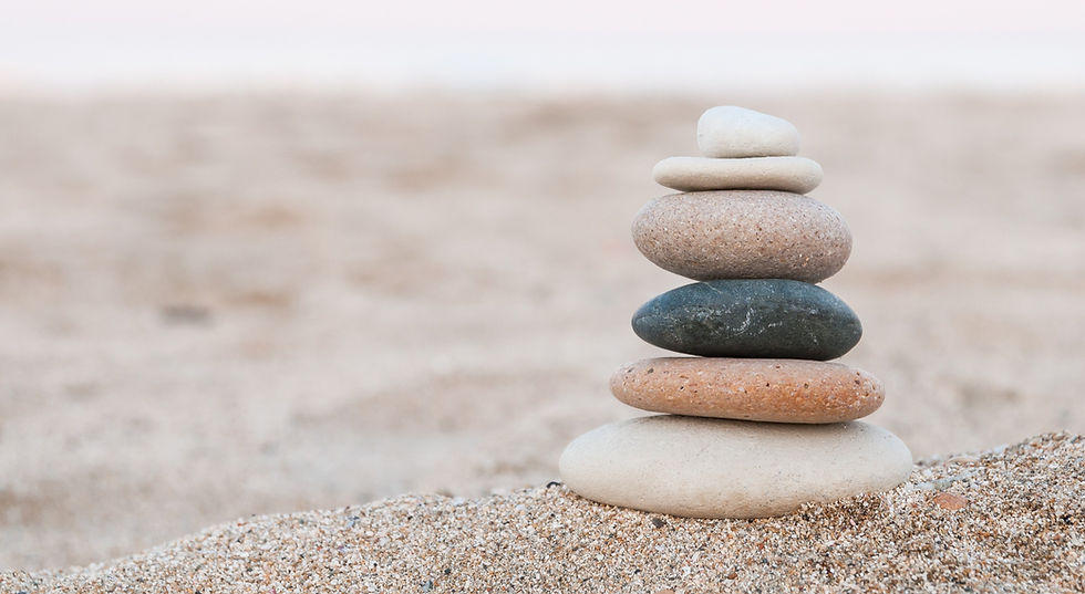 Stacked stones on a beach
