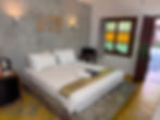 Modern Krabi villa accommodation with a large bed.