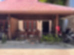 Krabi villa accommodation exterior with red roof and porch.