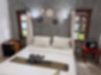 Modern bedroom at Krabi villa accommodation with white bed
