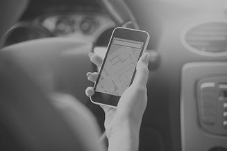close-up-female-hand-holding-her-phone-using-navigation-syste_edited.jpg