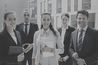 confident-businesspeople-standing-outside-office-building_edited.jpg