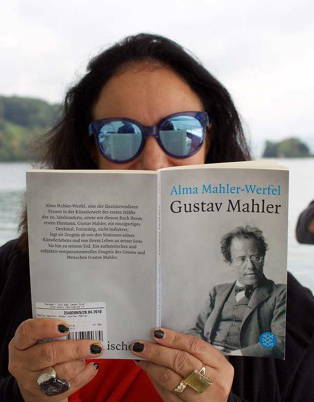 Berna-reading-Mahler-on-boat-Lucerne-2.j