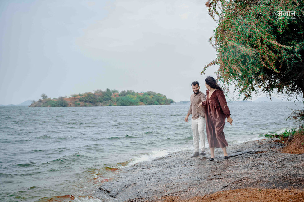 Couple walking beside Jawai Dam Rajasthan