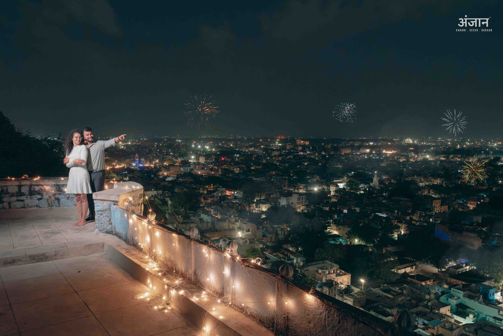 Couple overlooking Jodhpur city at night