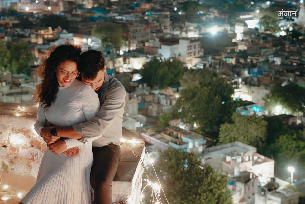 Pre-wedding couple on rooftop overlooking Jodhpur