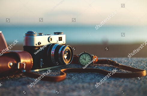 stock-photo-photo-of-vintage-camera-at-sunset-in-park-214475695_edited.jpg