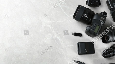 stock-photo-flat-lay-composition-with-equipment-for-professional-photographer-on-grey-marb