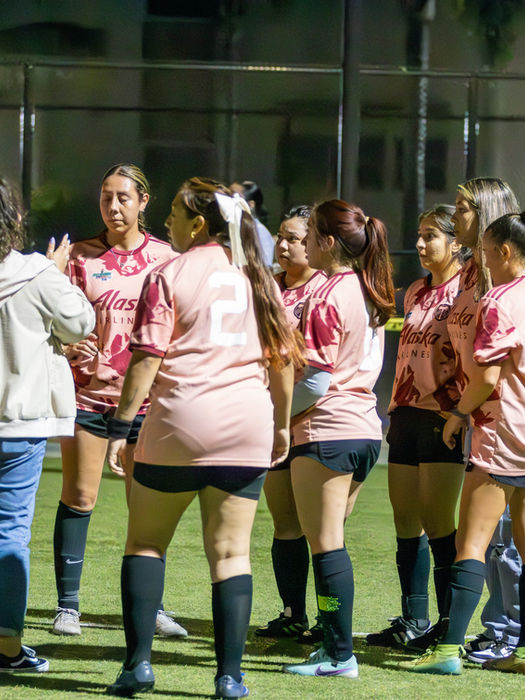 woman playing soccer