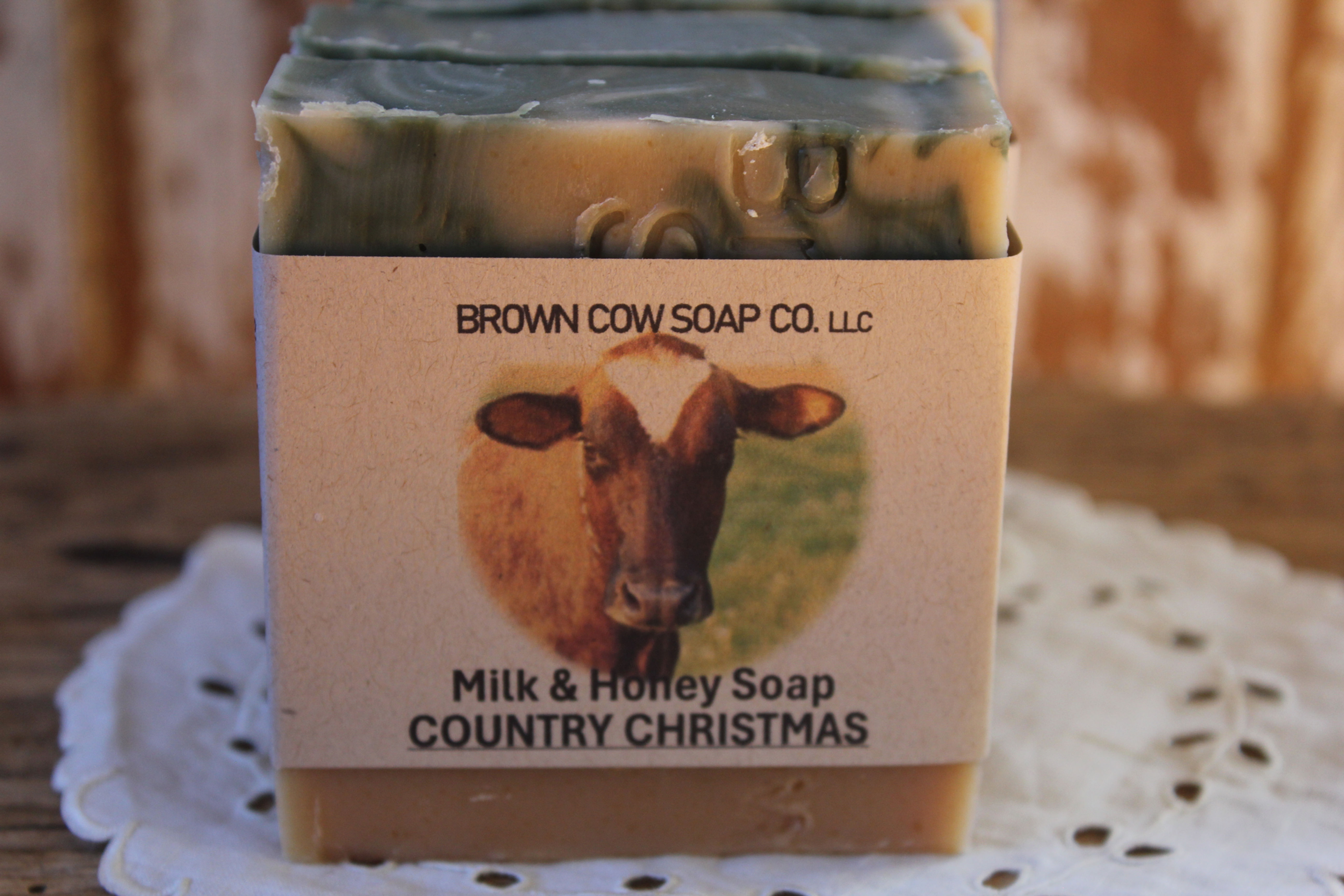 green swirl bar of soap with brown cow soap company label