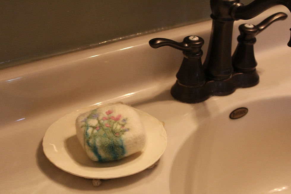 Thumbnail: white felted wool on a handmade soap bar