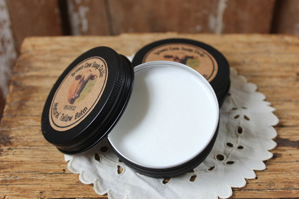 open tin of natural tallow balm on a table