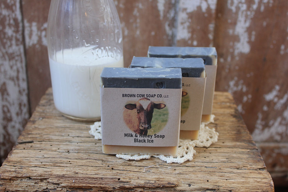 three natural handmade soap bars on a table