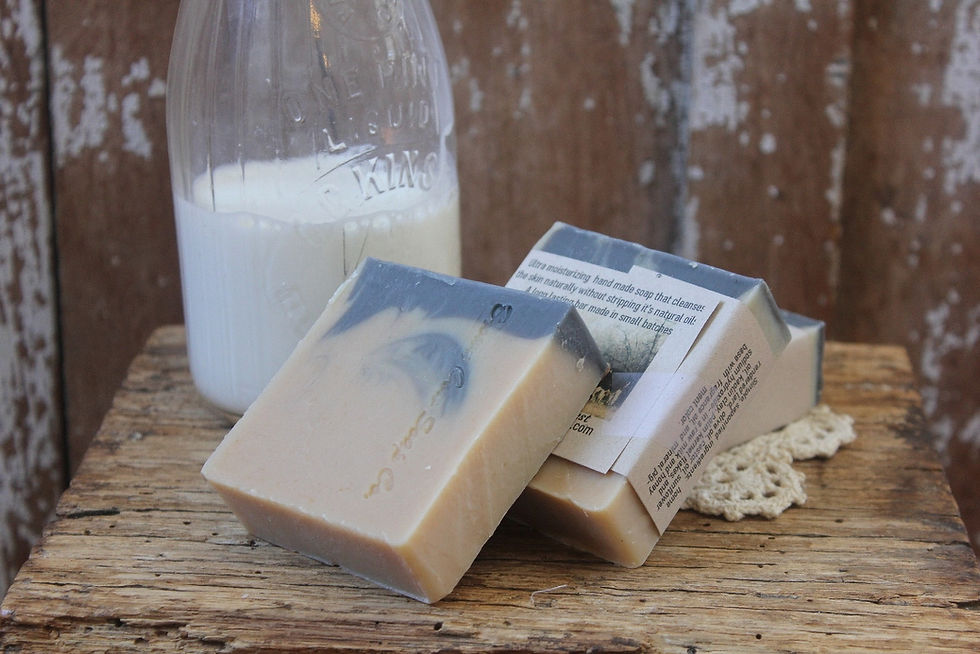 Thumbnail: black swirl natural lard based soap bars on a shelf