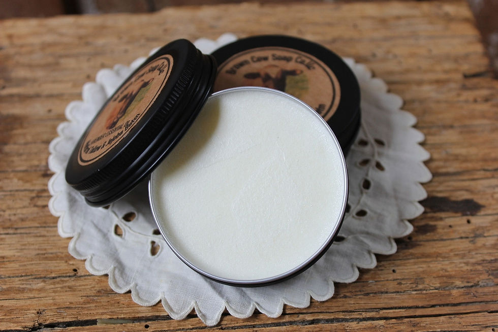 open tin of salve on a table