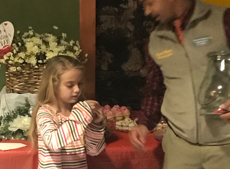 Mebane Business Association Valentines Social my sweet daughter helps Mo Bass draw the winners!