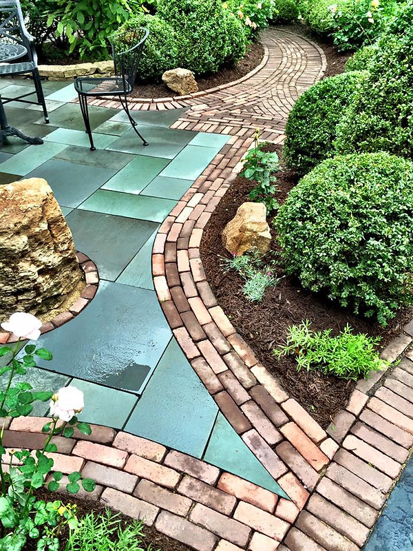 Cotswold Gardens, concrete front stoop demolition, replaced with Unilock products, blue stone, moss boulders and Copthorne.