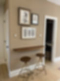 After- coat closet door on the left, powder room pocket door on the right