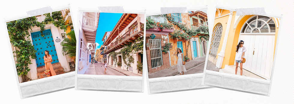 Calle empedrada del Centro Histórico de Cartagena con balcones coloniales llenos de flores y arquitectura colorida al atardecer.