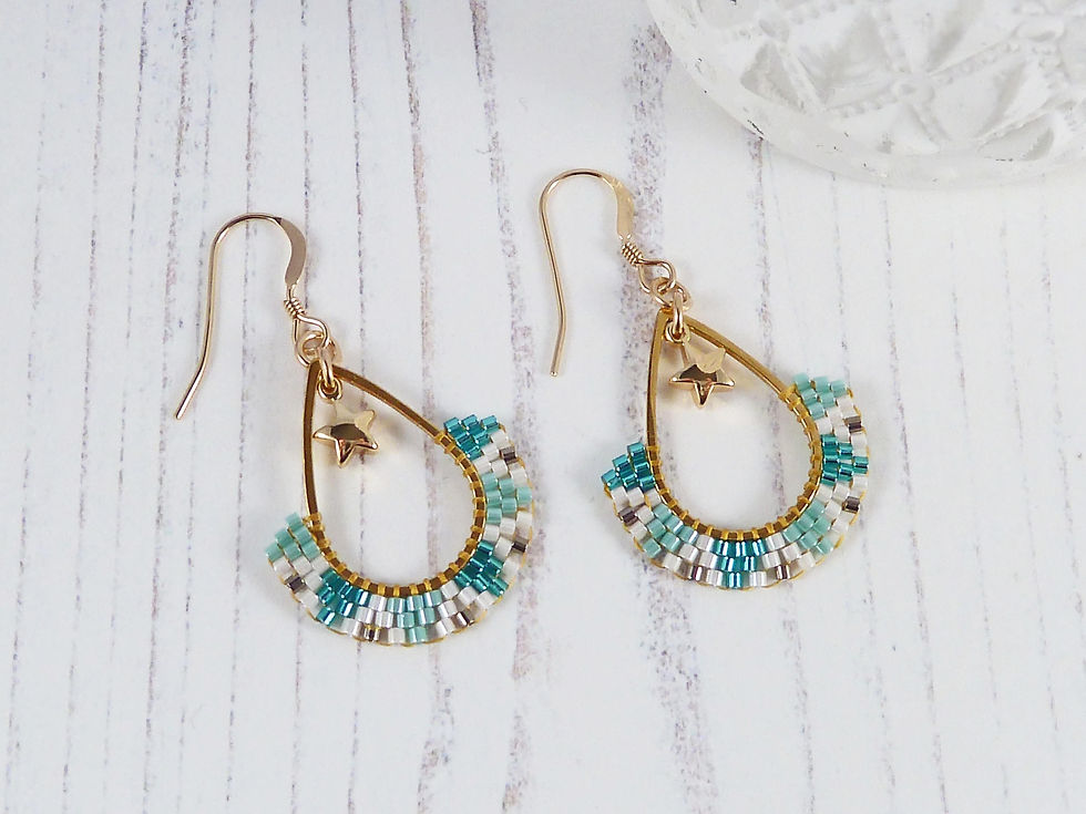 Thumbnail: Turquoise, White and Gold Teardrop and Star Beaded Earrings