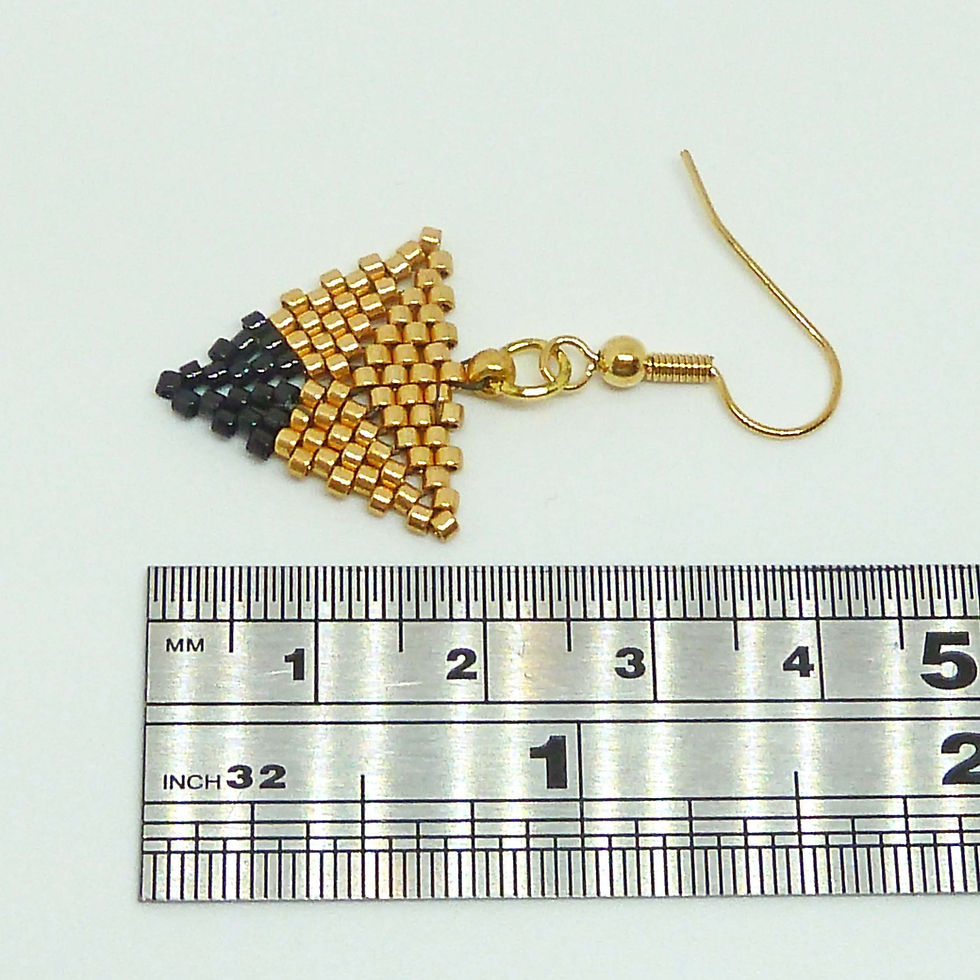 Thumbnail: Gold and Black Dipped Triangle Earrings