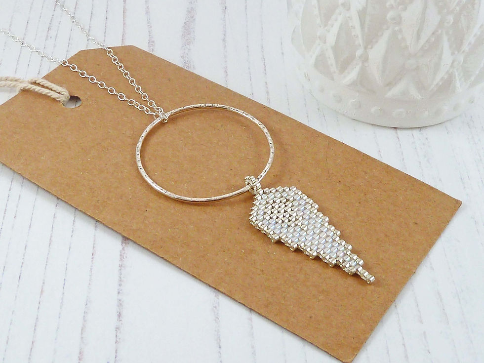 Thumbnail: Long Angel Wing Necklace with Silver Circle