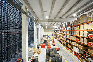 warehouse with heavy forklift and foot traffic on concrete floor showing high rated concrete use for commercial construction