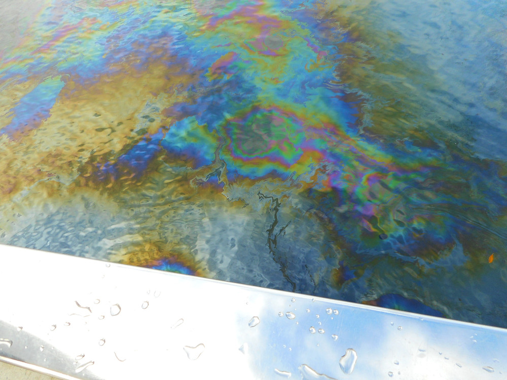 Oil shimmering on the surface of the sea