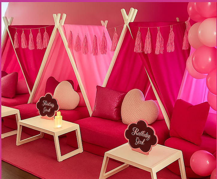 Barbie themed sleepover setup with doll box, pink teepee tents Pittsburgh