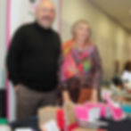 Photo de Stéphane Aucante et Mioara Gaubert derrière un stand avec des livres, au Salon du Livre des Balkans.