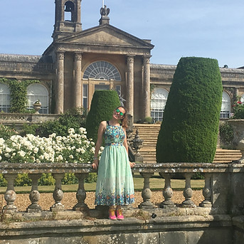 Denise in front of a palace