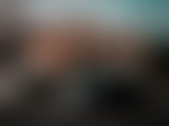 car speeding past a speed limit sign