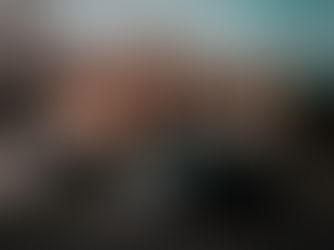 car speeding past a speed limit sign