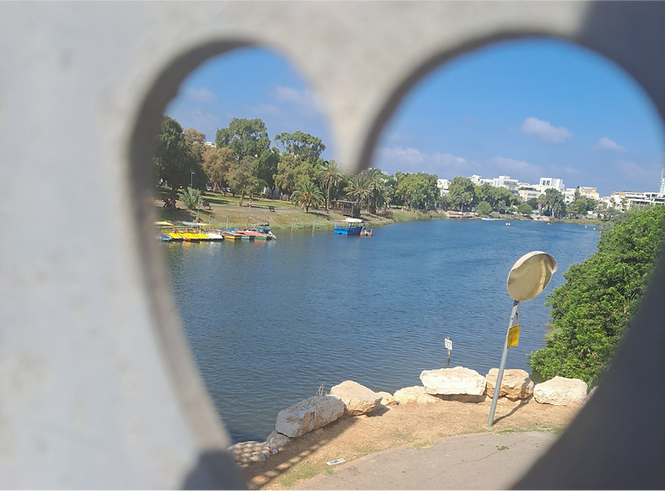 A Tale Of Tel Aviv - River view from heart shaped window