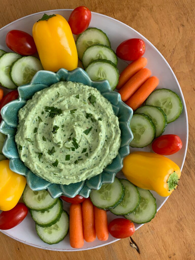 Greek Yogurt Herb Dip is rich in protein and nutritious fats from avocados and is a great spring park dip 