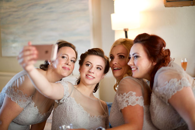 bridesmaids taking a selfie.jpg