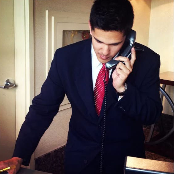 Josh working as a concierge at the Vancouver Marriott Pinnacle Hotel in downtown Vancouver before beginning his career in web design and real estate technology.