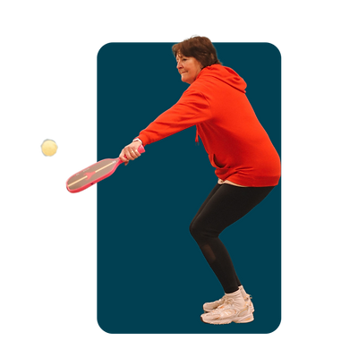 Lady playing pickleball at Pure Pickleball