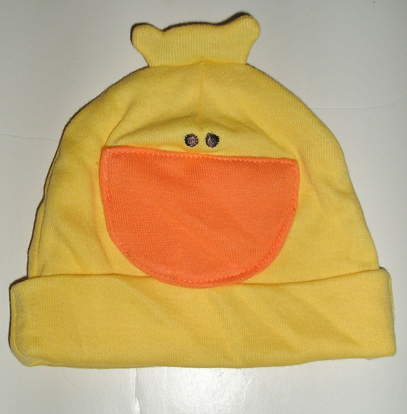 Gerber hat yellow/duck motif size 0-6 mo