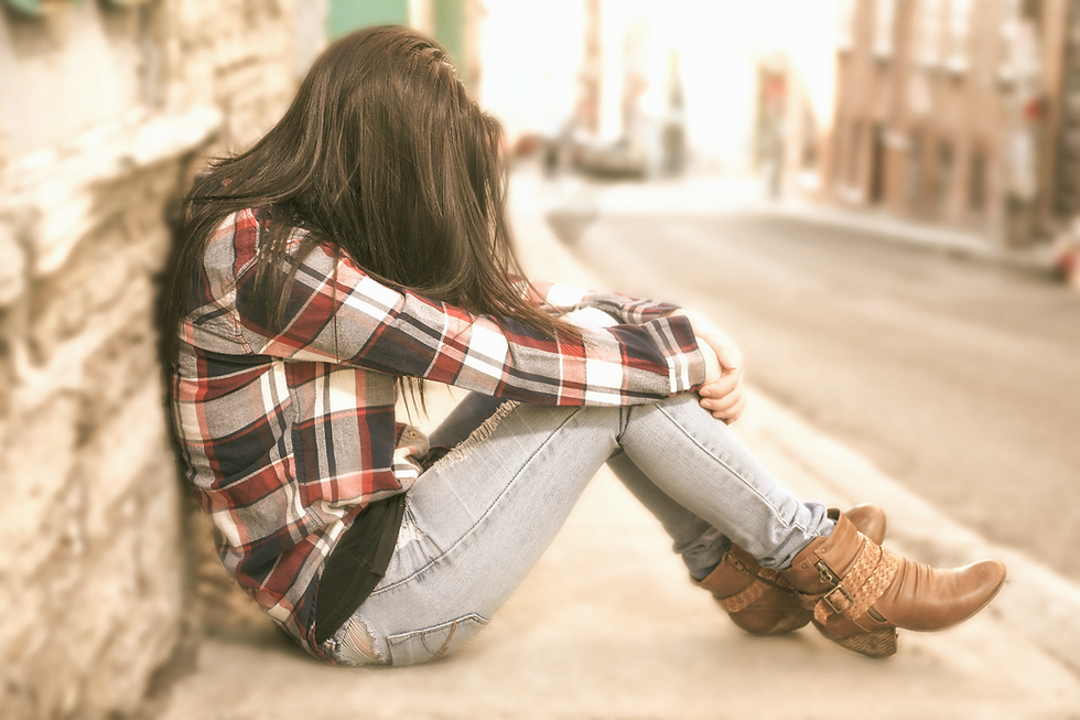 Woman Sitting Alone