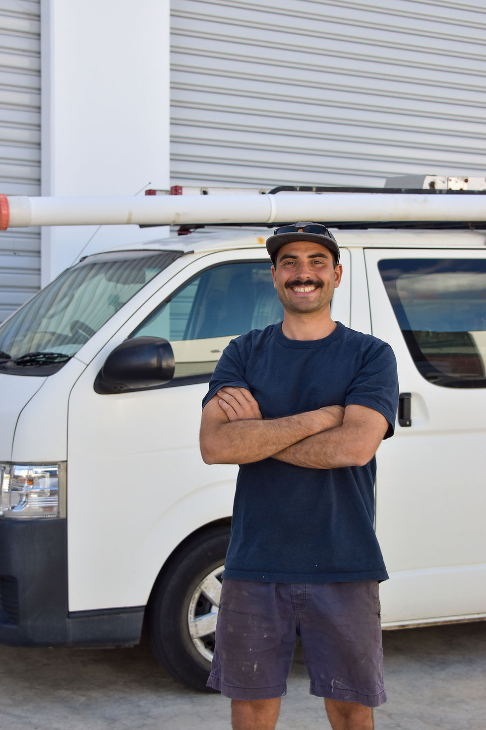 Worker in front of a van