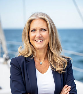 Woman in power suit on a boat