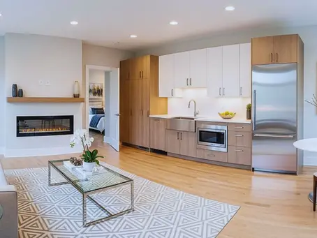 Modern in-law apartment interior with kitchen, living area, and bedroom. Peragallo Construction in Connecticut