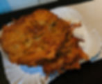 Reibekuchen, a delicious potato pancake sold from the market in Cologne, Germany