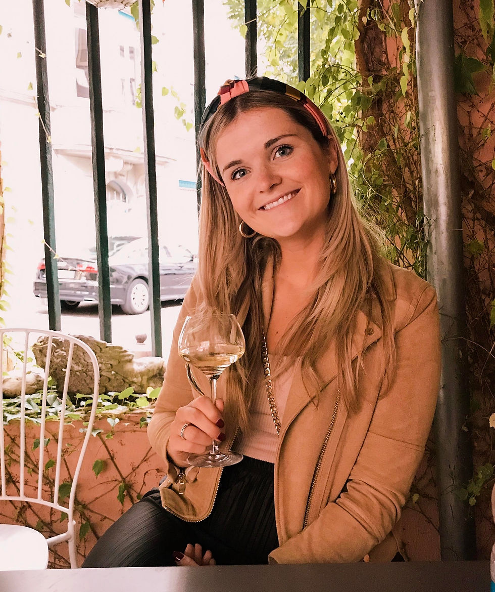 Girl with a glass of wine in Colmar, the Alsace region of France