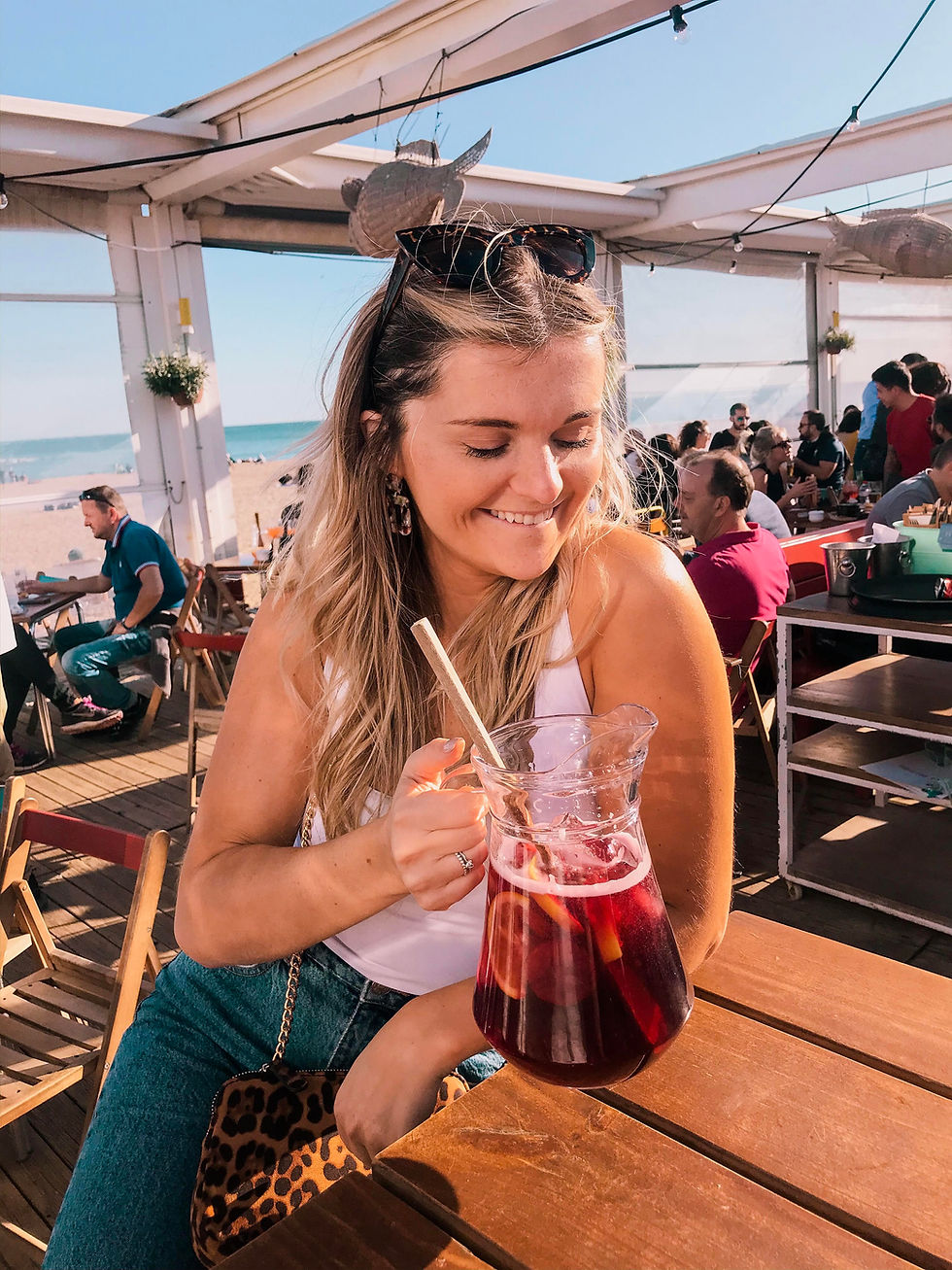 Girl with a pitcher of sangria in Barcelona, Spain
