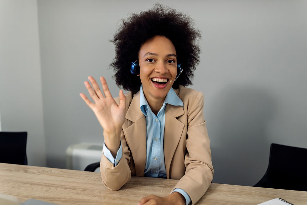 happy-african-american-businesswoman-waving-conference-call-office.jpg