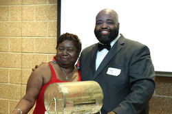 CME donor Denise with the winning raffle ticket